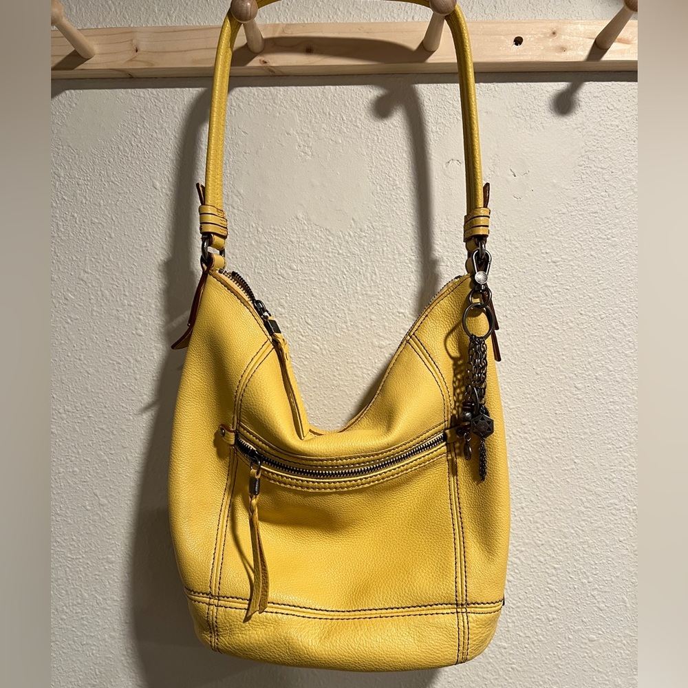 The Sak yellow leather hobo bag
